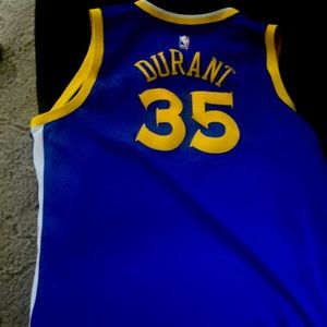 Blue and yellow GSW AWAY JERSEY